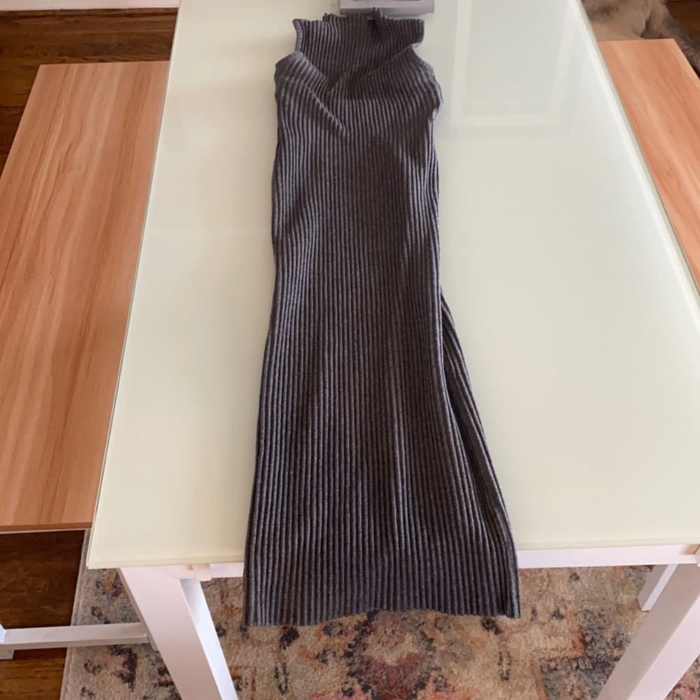 Beautiful high neck stretchy and form fitting classy mid length dress.